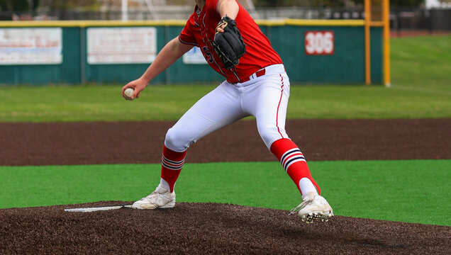 Pitcher throwing a pitch during a baseball game