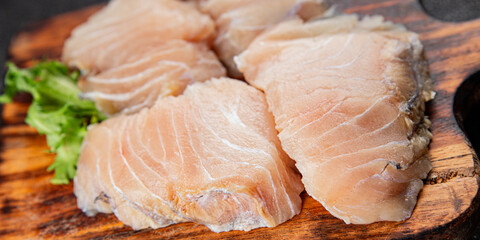 Raw fish fillet white fish seafood appetizer dish organic product fresh tasty gourmet food background on the table rustic food top view copy space pescetarian diet