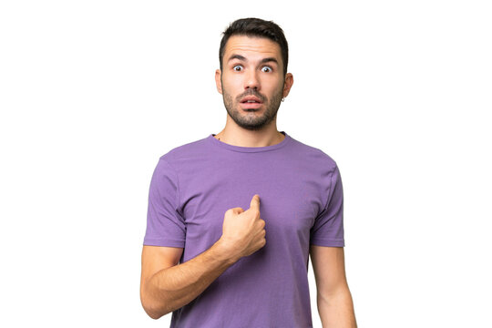 Young handsome caucasian man over isolated background pointing to oneself