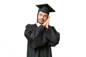Young university graduate man over isolated background making sleep gesture in dorable expression