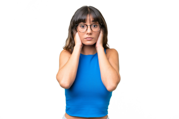 Young caucasian woman over isolated background frustrated and covering ears