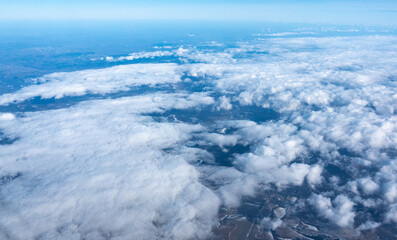 Fototapeta premium Blue sky with white clouds, flying above cloudy sky texture pattern, cloudscape blurred light