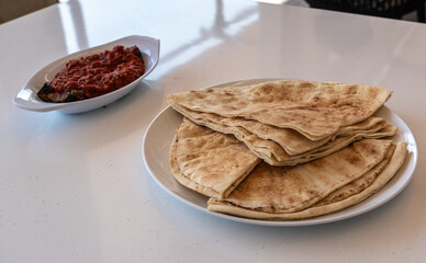 Traditional flatbread, lavash, wheaten pita flat bread or flatbread also known as pita bread