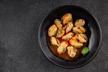 Mussels canned seafood appetizer dish organic product fresh tasty gourmet food background on the table rustic food top view copy space keto paleo pescetarian diet vegetarian food
