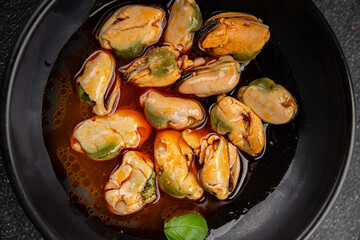 Mussels canned seafood appetizer dish organic product fresh tasty gourmet food background on the table rustic food top view copy space keto paleo pescetarian diet vegetarian food