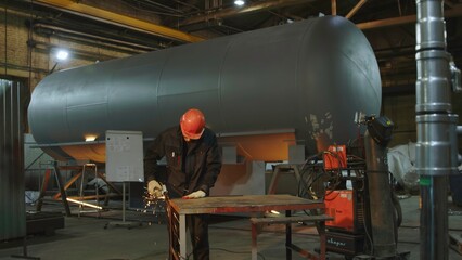 Industrial Worker Using Professional Welding Equipment in a Factory Setting to Create Products. Media