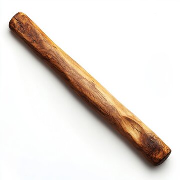 Isolated wooden stick with natural texture lying diagonally on white background