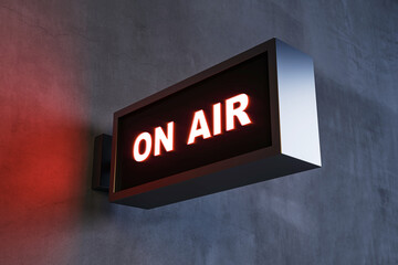 "Illuminated On Air Sign on Dark Wall with Red Glow, Modern Creative Design, Studio Symbolic Signage, Closeup Perspective, 3D Rendering." 3D Rendering