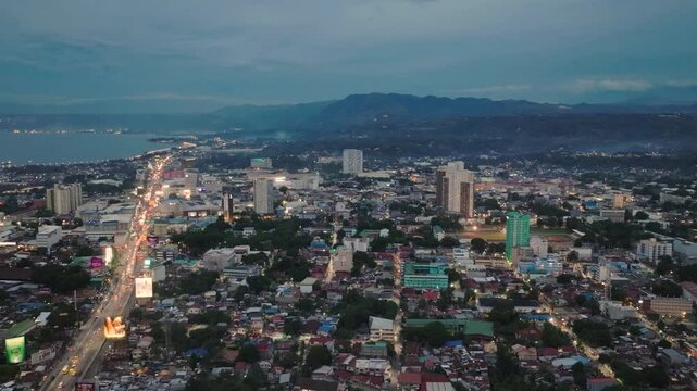Beautiful street with lights flicker in Cagayan de Oro. Mindanao, Philippines. Cityscape.
