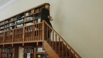 A Dedicated Librarian Methodically Organizing Books within a Cozy and Inviting Library Setting....