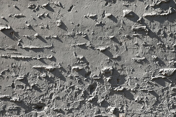 gray background, photo shows texture of old gray brick wall