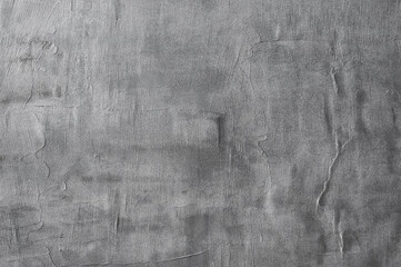 gray background, photo shows texture of gray wall close-up