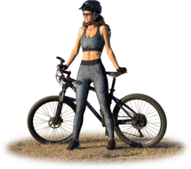 Girl on a mountain bike on offroad, beautiful portrait of a cyclist at sunset, Fitness girl rides a modern carbon fiber mountain bike in sportswear.
