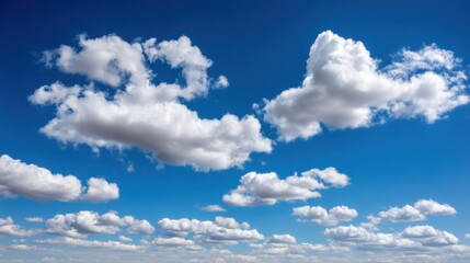 A Serene Skyscape Presents A Vibrant Blue Canvas Adorned With A Dynamic Array Of Fluffy White Clouds Creating A Sense Of Spaciousness And Freedom Evoking Peaceful Contemplation