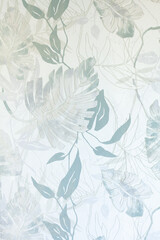 Soft botanical pattern with foliage and leaves of various sizes in neutral tones creates a serene and natural aesthetic.