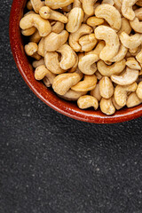 Cashew nuts natural superfood dish organic product fresh tasty gourmet food background on the table rustic food top view copy space
