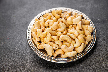Cashew nuts natural superfood dish organic product fresh tasty gourmet food background on the table rustic food top view copy space