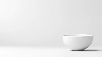 A white ceramic bowl sitting on a minimalist white surface, clean and simple composition, studio shot with soft lighting, and modern design concept.