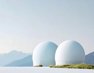 Two White Spheres with Mountain Backdrop