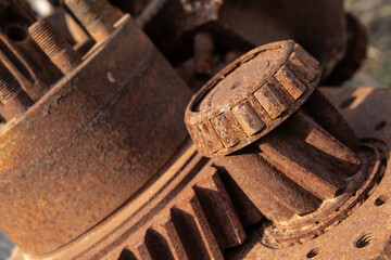 Image of heavily rusted and corroded mechanical gears and bearings.