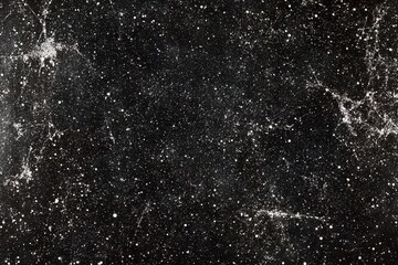 Obraz premium Cosmic dust nebulae. A deep space speckled with celestial particles, forming a breathtaking display of stellar remnants