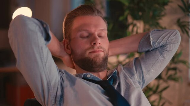 Man Working on Computer in a Modern Office Environment