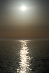Fototapeta premium Sunset on the Black Sea with a fishing boat in the foreground