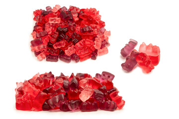 Assorted red gummy candies. Jelly bears.