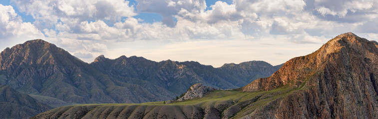 landscape with sunset light on rock mountains