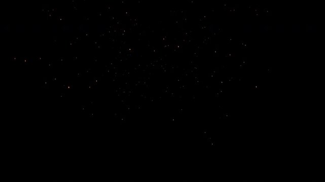 small fragments of floating burning bright orange gold red glowing embers and dust debris 4K