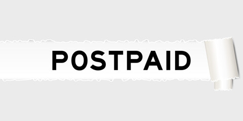 Ripped gray paper background that have word postpaid under torn part