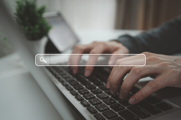 Search data and SEO technology, Hand typing on laptop keyboard searching for information on the...
