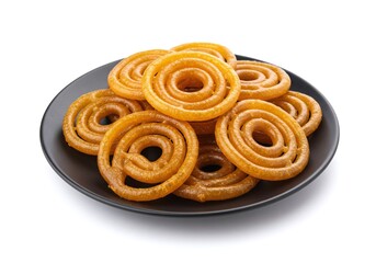 Fototapeta premium Pile of jalebi on a plate isolated on white background