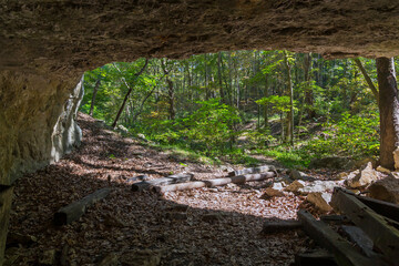 Entrance to a small cave near the Rock Quarry trail through the woods at the Rockwoods Reservation...