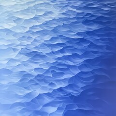 Obraz premium Serene blue sky with gentle waves lapping against a tranquil shore under bright sunlight