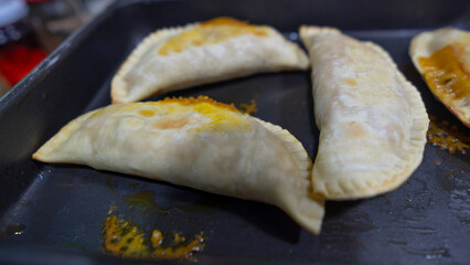 Oven-baked pastry with selected ingredients
