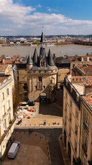 Obraz premium Porte Cailhau gate tower in Bordeaux near Garonne River