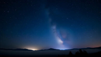 Majestic Milky Way Over Misty Landscape at Night