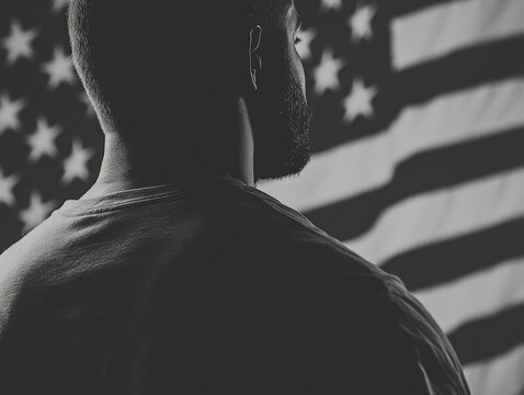 A compelling image of an African-American man in front of an American flag, embodying a strong sense of patriotism and determination.