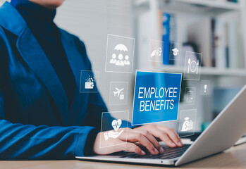 Employee Benefits and Compensation Strategy Concept. Businesswoman typing on laptop with icons...