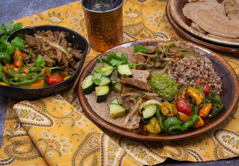 Buckwheat, seitan roast, pesto and veggie platter, an Eastern European dish