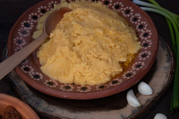Eastern European corn mush on clay plate