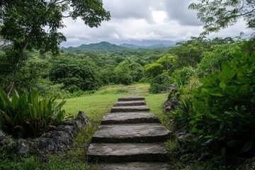 Obraz premium Ancient Mayan temple with stone steps and jungle hills