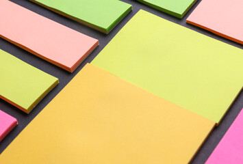 Various blank paper multicolored stickers. Sticky note collection on blue background