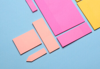 Various blank paper multicolored stickers. Sticky note collection on blue background