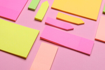 Various blank paper multicolored stickers. Sticky note collection on blue background