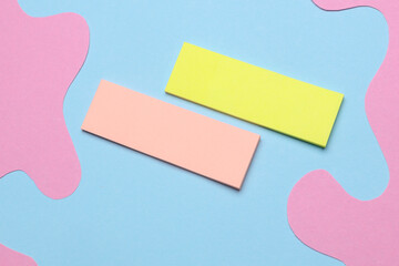 blank paper multicolored stickers. Sticky note collection on blue pink background