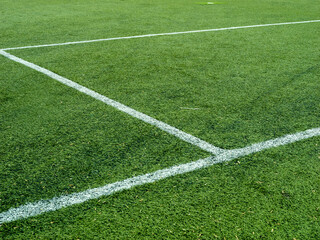 Obraz premium A soccer field with white lines on it