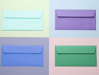 Group of colored envelopes on colored paper. Creative layout