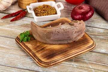 Steamed pork tongue with mustard